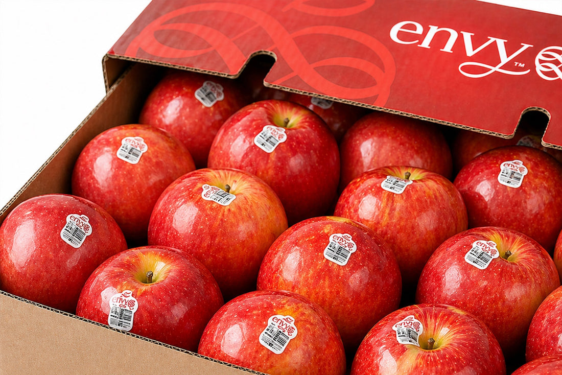 Juicy red Envy apples close-up in Singapore supermarket, sweet crunchy fresh apples promo, cheap Envy apples, glossy premium apples with cut slice showing crisp texture, best value fresh fruit Singapore wholesale fruits