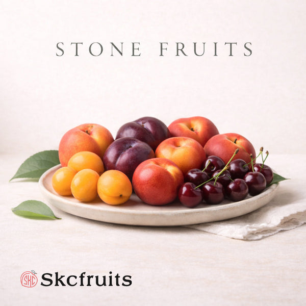 Skcfruits stone fruits like mangoes, peaches, nectarines on neutral background
