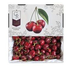A pack of Gold Reserve Tasmanian Cherries, showing a box with cherries visible through the transparent packaging, accompanied by the brand's logo and the phrase 'NEW ZEALAND CHERRIES'.