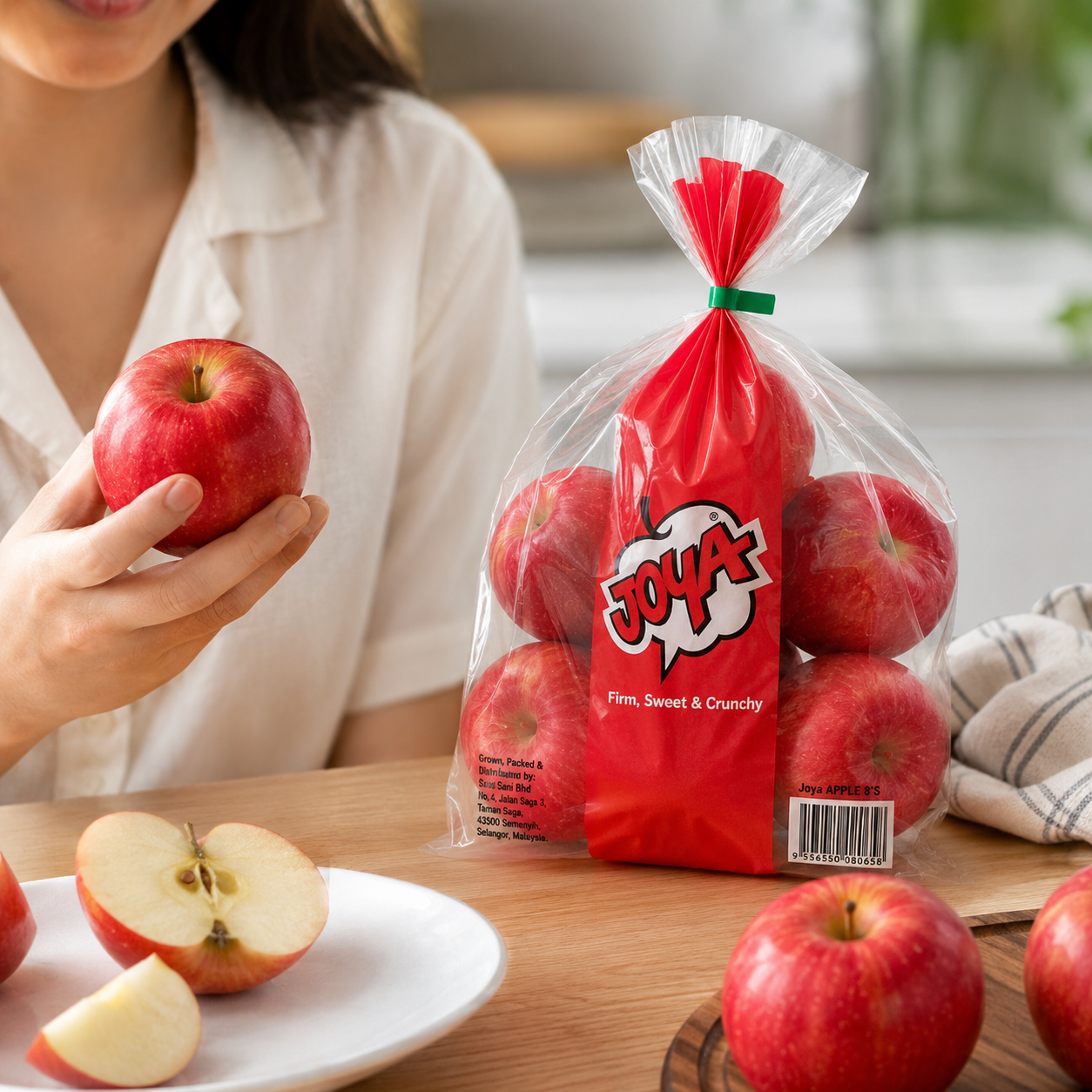 Cut Joya apple showing pale crisp flesh for fresh snacking