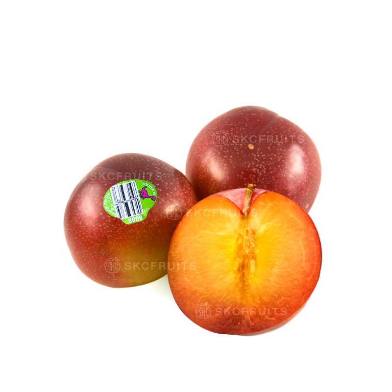 Dinosaur Egg Candy Pluots with speckled dinosaur egg fruit skin Dinosaur egg fruit also known as dinosaur pluot