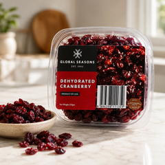 Dried cranberries paired with cheese crackers and nuts on a platter
