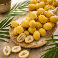 Fresh dates fruits with golden yellow skin and crisp texture