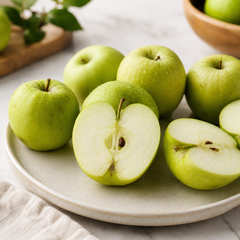 Green apple slices prepared for Granny Smith apple juice and fruit platters