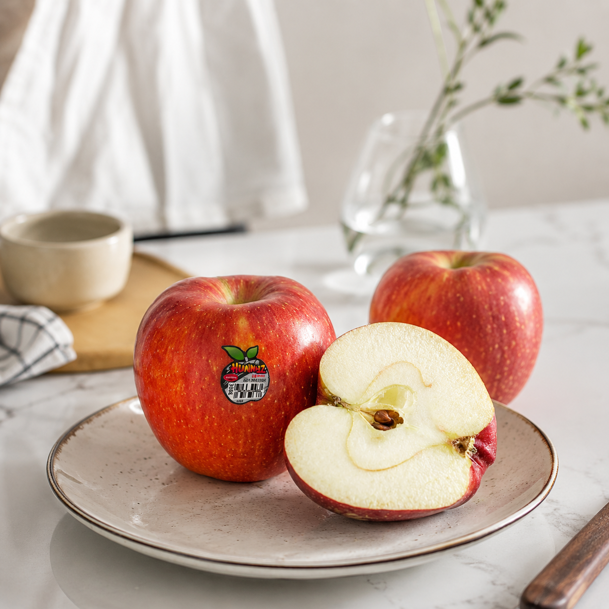 Cut Hunnyz Apple showing juicy pale flesh and crisp texture