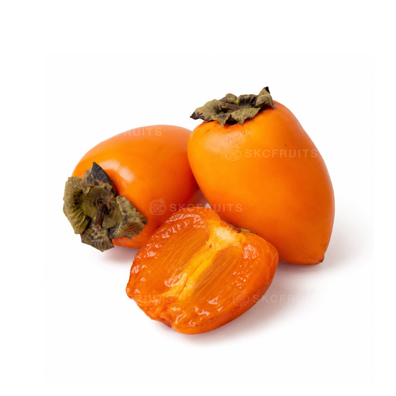 Imported Hachiya Persimmon with orange acorn shape and soft sweet flesh