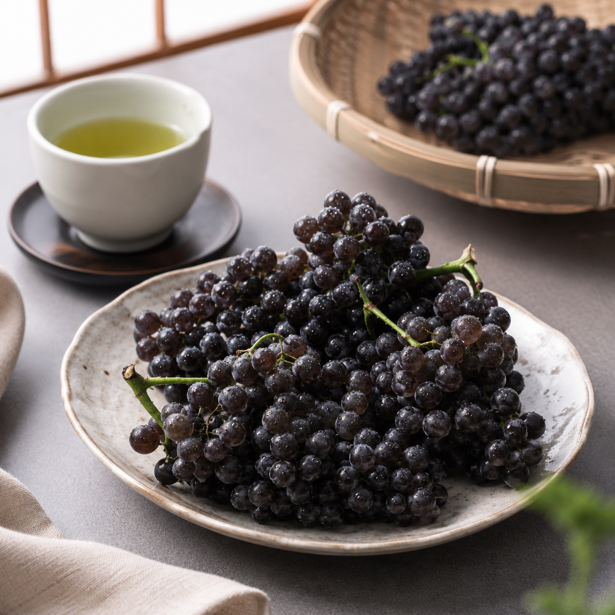Japanese champagne grapes served chilled on a dessert plate