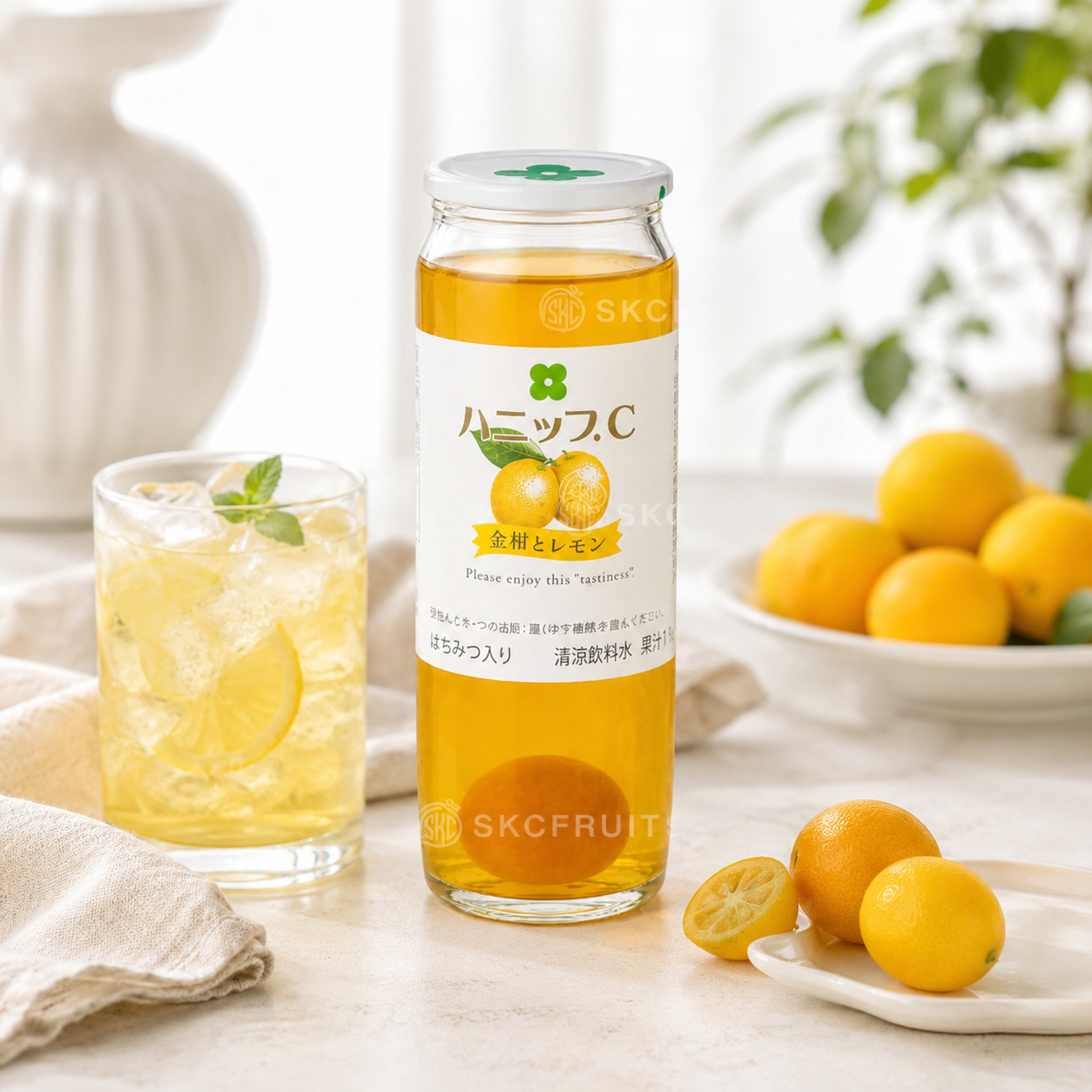 Hanippu C kinkan and lemon drink with honey and whole kinkan fruit inside
