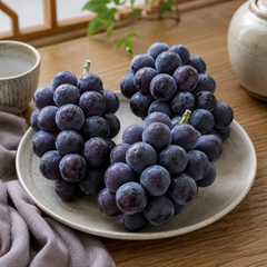 Korean Kyoho grapes with large dark purple black berries
