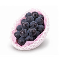 Korean Kyoho grapes with large dark purple black berries