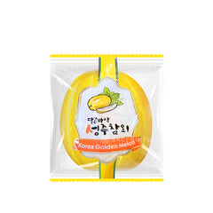 Cut open Korean yellow melon showing crisp white flesh and edible seeds