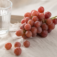 Red and purple grapes served on a fresh fruit platter