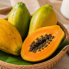 Ripe papaya fruit bowl with fresh orange papaya cubes