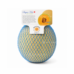 Cut open Sugar Kiss Melon showing juicy soft melon flesh and seeds
