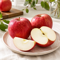 Cut Yeongju Fuji apple showing crisp juicy apple flesh