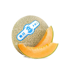 Cut open China Husk Melon showing orange melon flesh and seeds