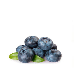 A pile of fresh blueberries with leaves on a white background.