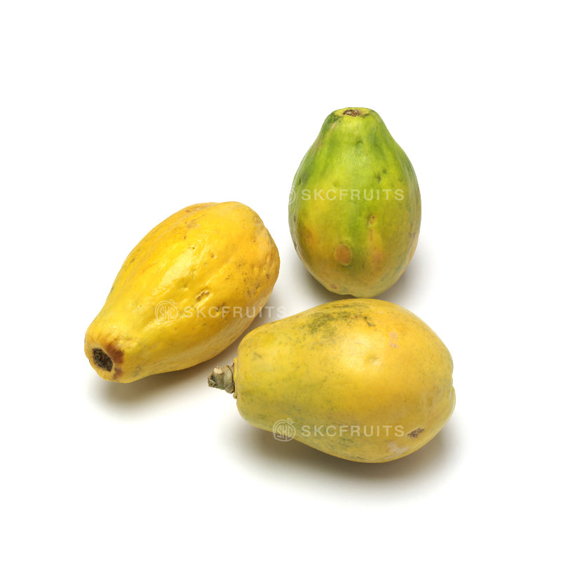 Hawaiian Papaya with green to yellow tropical fruit skin