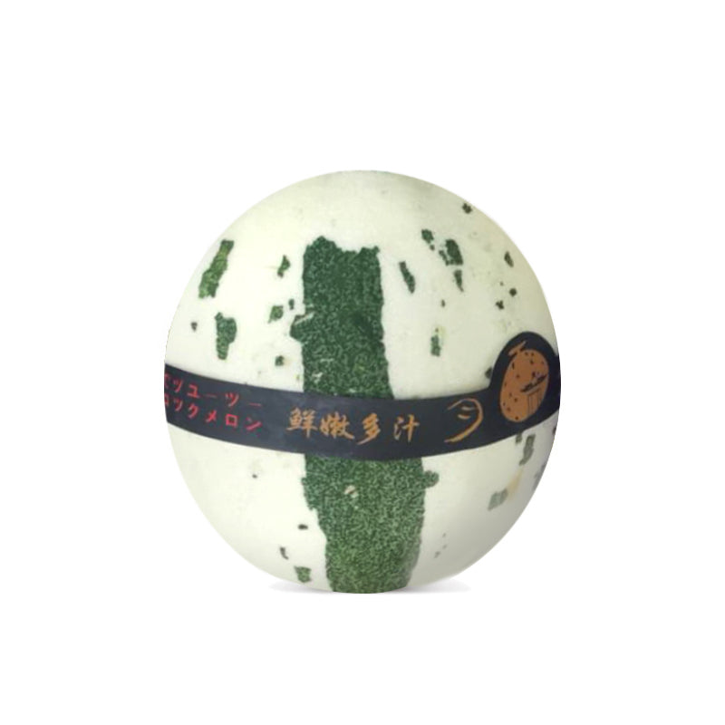 Cut open Honey Cloud Melon showing juicy white flesh and melon seeds