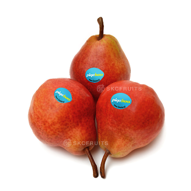 Imported Piqa Boo Pear with bright red skin and crisp white flesh
