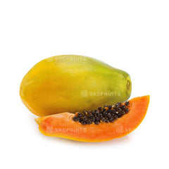 Fresh Papaya with green to yellow tropical fruit skin