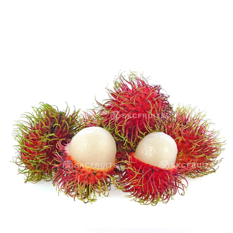 Red rambutan fruit with juicy white flesh
