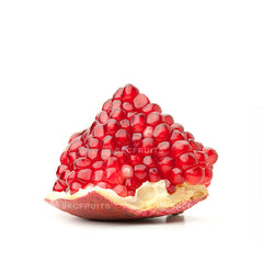 Fresh Spanish pomegranate fruit with juicy red seeds
