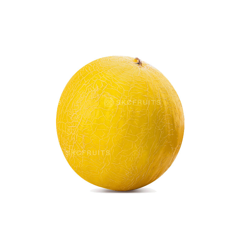 Cut open yellow candy melon showing crisp deep orange flesh